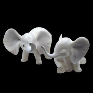 Pair Vintage White Porcelain Elephants Signed Tony Sitting & Standing Trunk Up